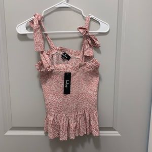 Lulu’s pink and white floral tie strap tank.